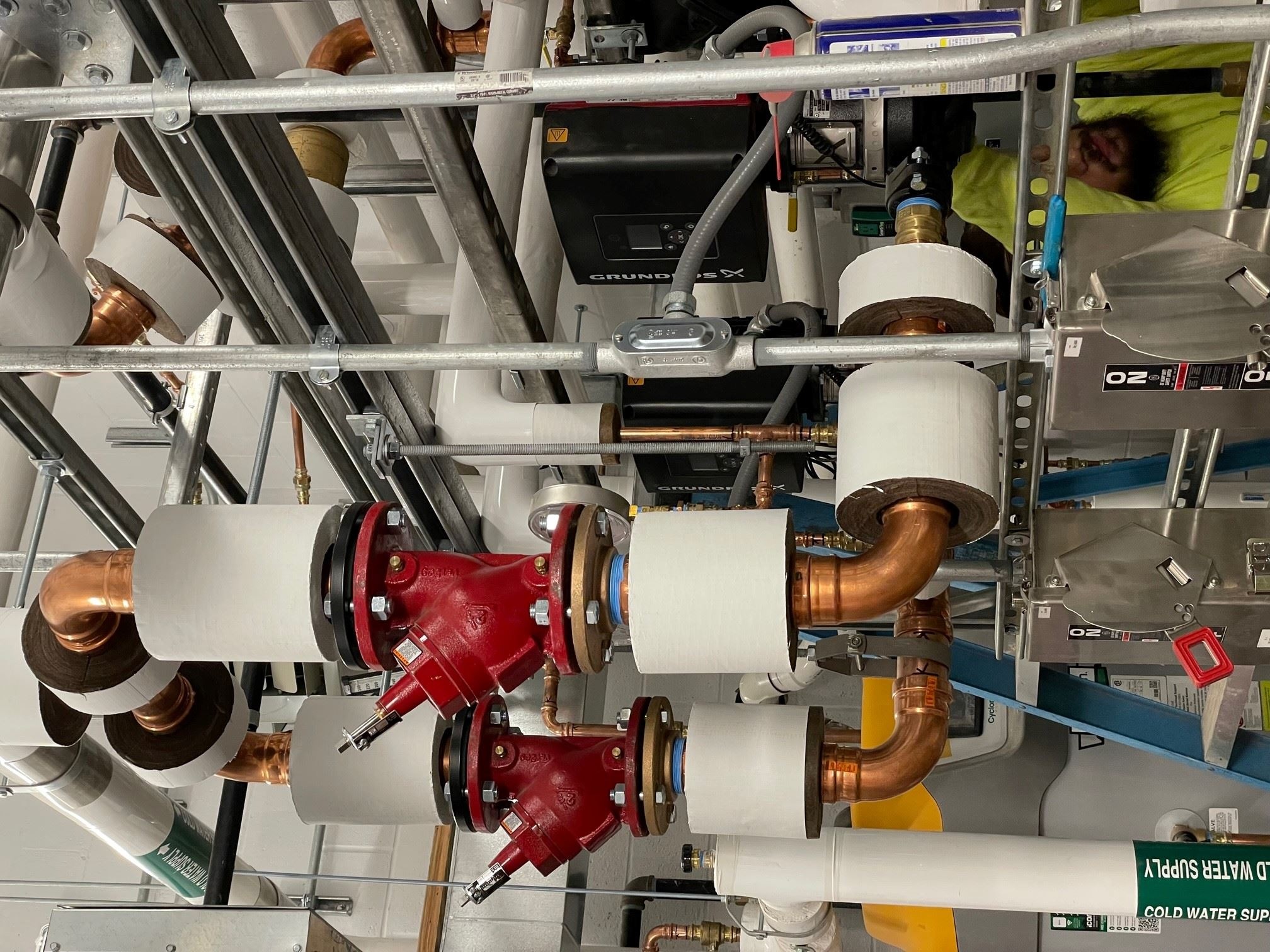 Installation of Insulation on 2 inch HWS R Pipeline